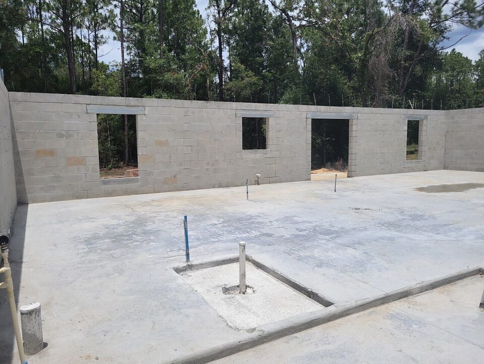Concrete-block walls and slab foundation of a new home under construction in Citrus Springs.